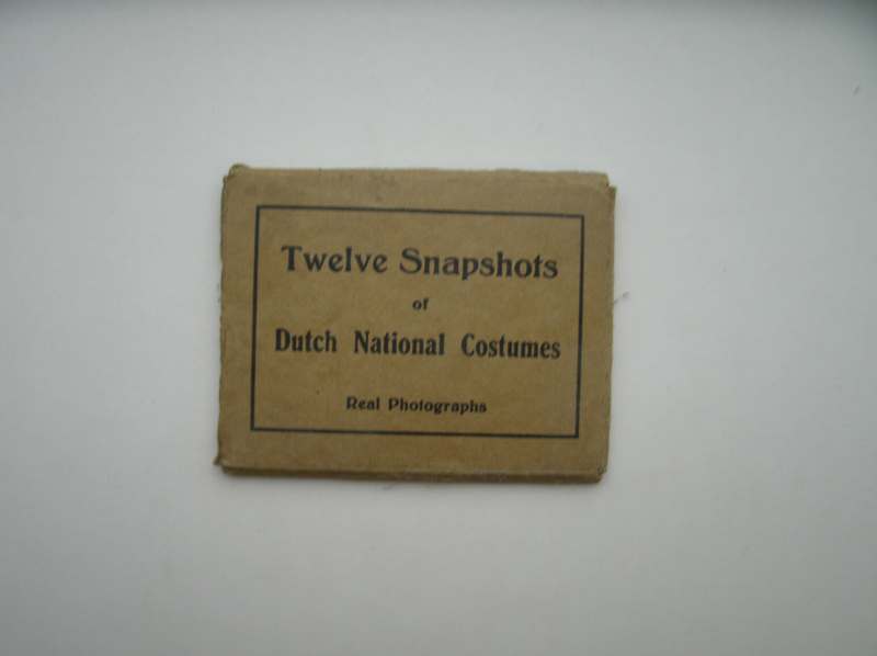 nn. - Twelve snapshots of Dutch National Costumes. Real photographs.