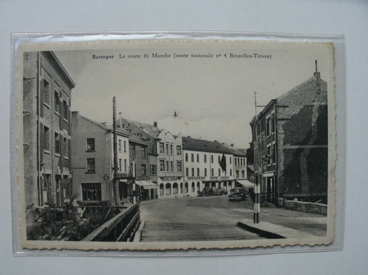 postcard. ansichtkaart. postkarte. - Bastogne. La route de Marche. (Route nationale no 4 Bruxelles-Treves).