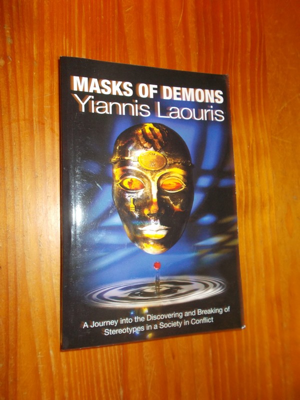 LAOURIS, YIANNIS, - Masks of demons. A journey into the discovery and breaking of stereotypes in a society in conflict.